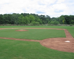 A baseball diamond representing a link to the Lodging and Facilities image gallery.